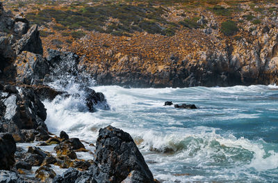 Scenic view of rocks in sea