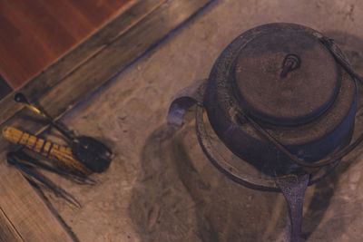 High angle view of old rusty metal on table