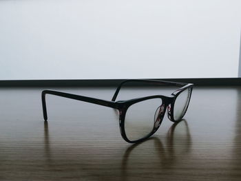 Close-up of sunglasses on table