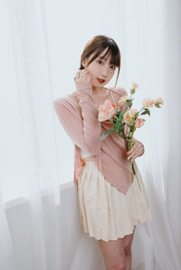 Young woman with bouquet