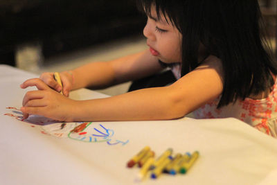 Close-up of girl drawing