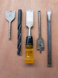 Directly above shot of work tools on wooden table