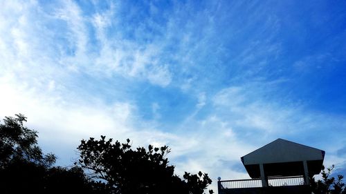 Low angle view of built structure against blue sky