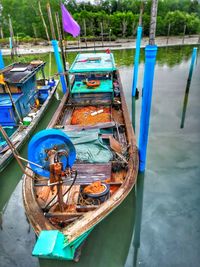 High angle view of fishing boat moored in lake