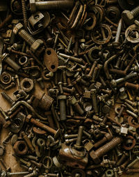 Full frame shot of rusty screws and bolts