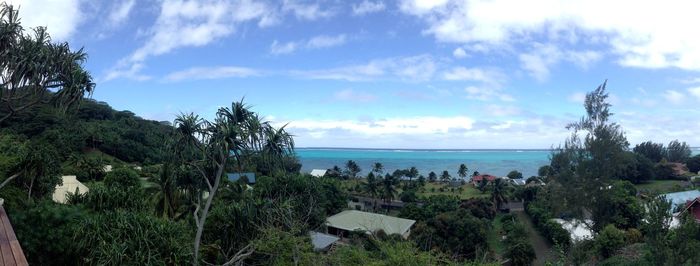 Scenic view of sea against cloudy sky