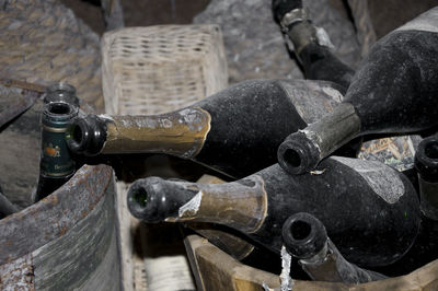 Close-up of old wine bottles