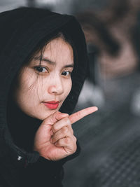 Close-up portrait of young woman