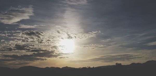 Low angle view of silhouette mountain against sky during sunset