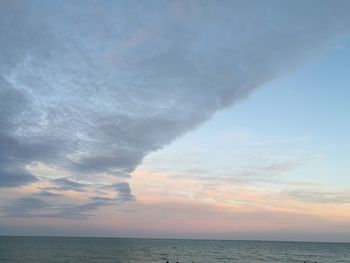 Scenic view of sea against sky at sunset