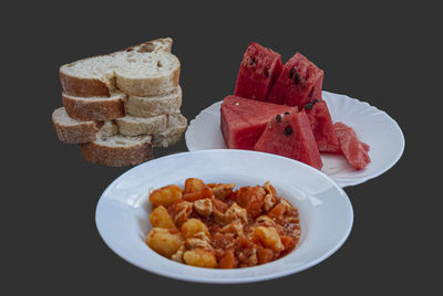 High angle view of food on table against black background