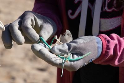 Close-up of person holding umbrella