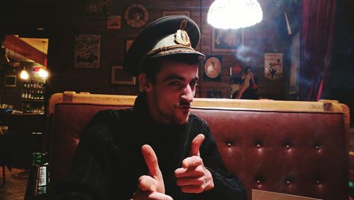 Portrait of young man looking at camera