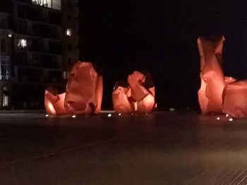 Full length of woman in dark room