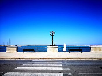 Street against blue sky