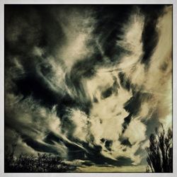 Low angle view of cloudy sky