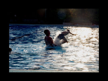 People swimming in pool