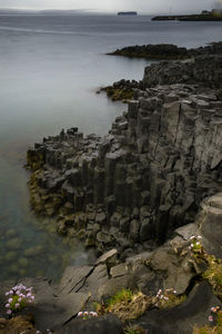 Scenic view of basalt columns on beach