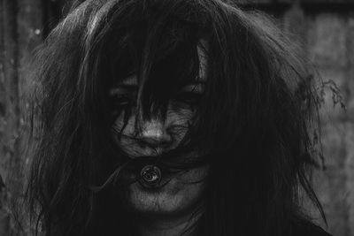 Close-up of woman frizzy hair