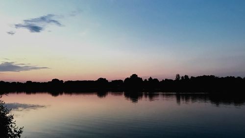 Scenic view of lake during sunset