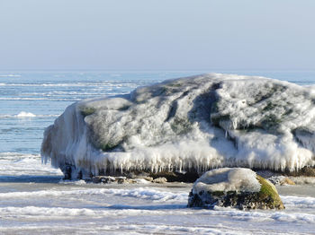 Scenic view of frozen sea against clear sky