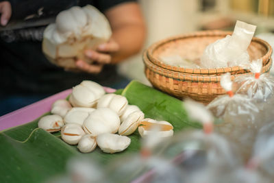 Close-up of person preparing food