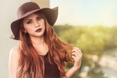 Close-up portrait of beautiful young woman