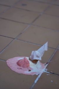 High angle view of paper on floor