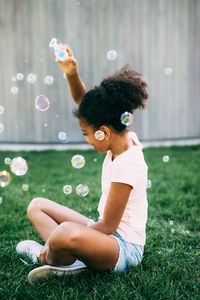 Girl playing in garden