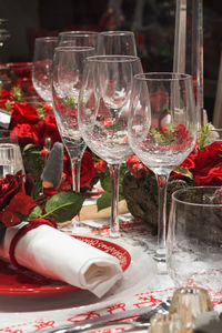 Close-up of wine glasses on dining table