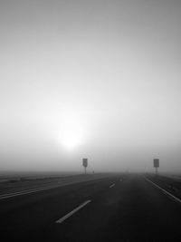 Empty road against sky