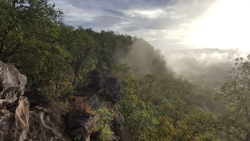 Scenic view of landscape against cloudy sky