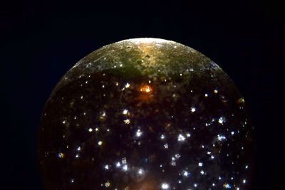 Low angle view of moon against sky at night