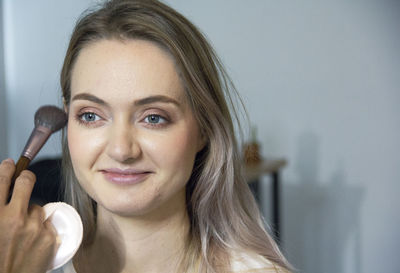 Portrait of a smiling young woman