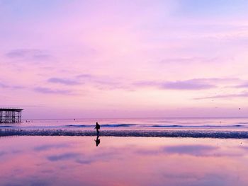 Scenic view of sea at sunset