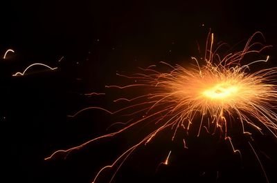 Firework display at night