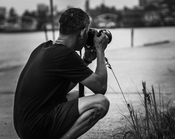 Man photographing from camera