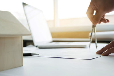 Man using laptop on table