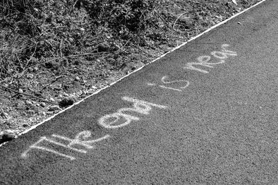 High angle view of text on road