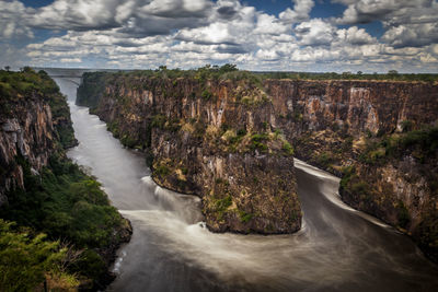 View of waterfall along rocks