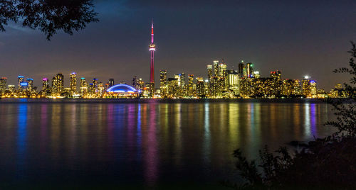 Illuminated buildings in city at night