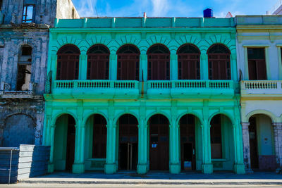 Low angle view of building against blue sky