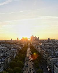 High angle view of city at sunset