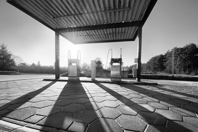 Small countryside gas station in backlight