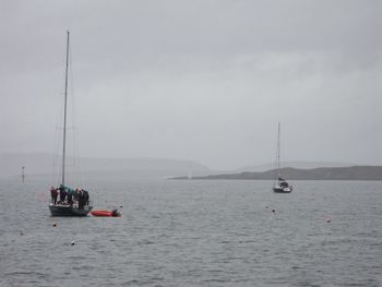 Boats sailing in sea