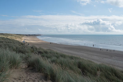 Scenic view of beach against sky