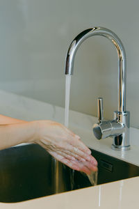 Close-up of a faucet in bathroom