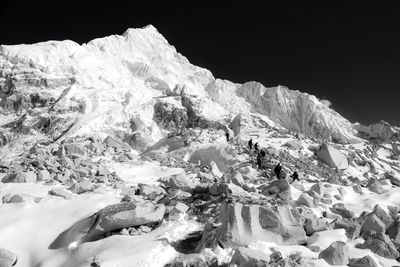 Scenic view of snow covered mountains