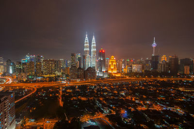 Illuminated cityscape at night