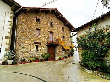 View of road along buildings